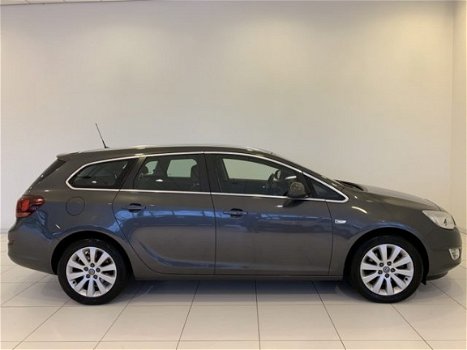 Opel Astra Sports Tourer - 1.6 Turbo Cosmo Climate | Cruise | 1.000, - Slooppremie - 1