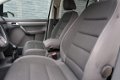 Volkswagen Touran - 1.4 TSI Comfortline 7p. 1.4 TSI Comfortline 7 persoons Incl. 6 maanden BOVAG gar - 1 - Thumbnail