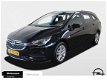 Opel Astra Sports Tourer - 1.0 Online Edition 105PK (Navigatie - Parkeersensoren voor & achter - DAB - 1 - Thumbnail
