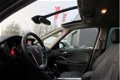 Opel Zafira Tourer - 1.4 Cosmo 7p. Cruise / Navi / Airco / Dakraam - 1 - Thumbnail