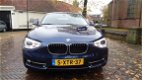 BMW 1-serie - (f20) 116i 136PK 5D Aut. Bus. Sport Line/RIJKLAAR PRIJS - 1 - Thumbnail