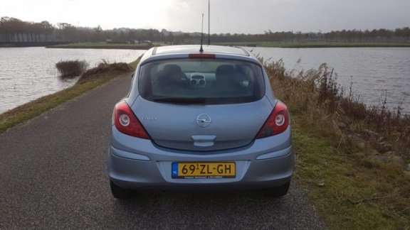 Opel Corsa - 1.2-16V Enjoy - 1