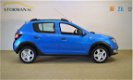 Dacia Sandero - TCe 90 Stepway | RIJKLAARPRIJS INCLUSIEF AFLEVERPAKKET T.W.V. € 695, - | - 1 - Thumbnail