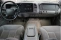 GMC Suburban - 2500 8 Persoons Youngtimer Airco - 1 - Thumbnail