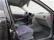 Toyota Avensis - 1.8 Luna Leanburn / Airco / 5-deurs / elek ramen / Automaat/ - 1 - Thumbnail