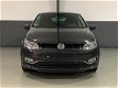 Volkswagen Polo - 1.2 TSI DSG Lounge Clima / PDC / Cruise Controle - 1 - Thumbnail