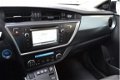 Toyota Auris - 1.8 Hybrid Dynamic | Navigatie | Camera A. | Cruise C. | Clima | - 1 - Thumbnail