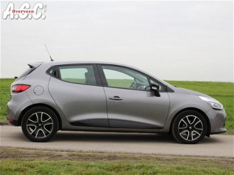 Renault Clio - 1.5 DCi Airco Navi PDC Cruise Control - 1