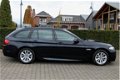 BMW 5-serie Touring - 520d High Executive Aut M-Pakket Xenon Leder Sportstoelen ECC Cruise LMV - 1 - Thumbnail