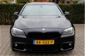 BMW 5-serie Touring - 520d High Executive Aut M-Pakket Xenon Leder Sportstoelen ECC Cruise LMV - 1 - Thumbnail