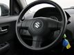 Suzuki Swift - 1.5 GLS 102PK 5drs / Airco / Bluetooth - 1 - Thumbnail