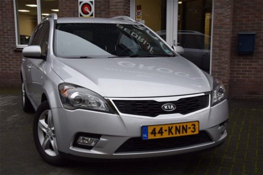 Kia Cee'd Sporty Wagon - CEED 1.4 CVVT X-ECUTIVE NAVI/AIRCO - 1