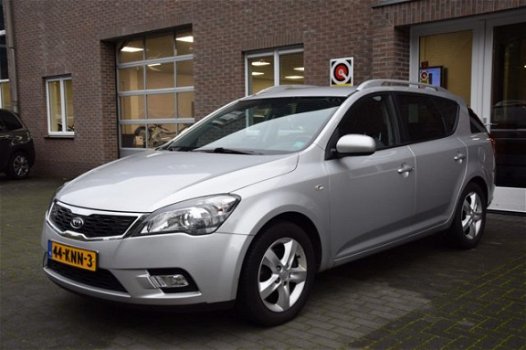 Kia Cee'd Sporty Wagon - CEED 1.4 CVVT X-ECUTIVE NAVI/AIRCO - 1