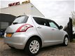 Suzuki Swift - 1.2 Bandit 5drs. Airco/Radio-Cd-Mp3/Isofix 100% Dealer-onderhouden - 1 - Thumbnail