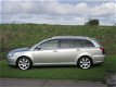 Toyota Avensis Wagon - 2.4 EXE AUT+LEER+NAVI+PDC+AFNTRHK - 1 - Thumbnail