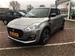 Suzuki Swift - 1.2 Sportline GT pakket, airco, navigatie, dubbele uitlaat, dak spoiler, 17'' two-ton - 1 - Thumbnail