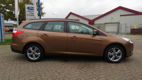 Ford Focus Wagon - 1.0 EcoBoost Edition Navigatie, PDC, Cruise, Trekhaak, 52618 km - 1 - Thumbnail