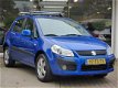 Suzuki SX4 - 1.6 Exclusive Airco, Keyless, Trekhaak - 1 - Thumbnail