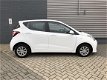 Hyundai i10 - 1.0i Comfort Navigation Pack (Cruise / Bluetooth / Airco) - 1 - Thumbnail