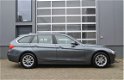 BMW 3-serie Touring - 316i Origineel NL Trekhaak/Xenon/Navigatie - 1 - Thumbnail