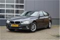 BMW 3-serie Touring - 316i Origineel NL Trekhaak/Xenon/Navigatie - 1 - Thumbnail