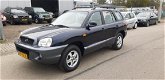 Hyundai Santa Fe - 2.4i-16V 4WD Navy , met Clima - 1 - Thumbnail