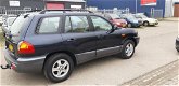 Hyundai Santa Fe - 2.4i-16V 4WD Navy , met Clima - 1 - Thumbnail