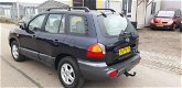 Hyundai Santa Fe - 2.4i-16V 4WD Navy , met Clima - 1 - Thumbnail