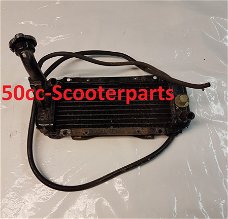 Radiateur Kymco dink 19010-KFA5-9000 Gebruikt