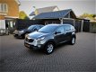 Kia Sportage - 2.0 X-ecutive Camera/Pdc/Leder/Cruise/Navi - 1 - Thumbnail