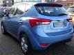 Hyundai ix20 - 1.4i i-Drive Airco / Parkeerhulp / Lm velgen - 1 - Thumbnail