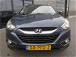 Hyundai ix35 - 2.0i Business Edition NAVI, Trekhaak, half Leder - 1 - Thumbnail