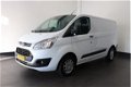 Ford Transit Custom - 2.0 TDCI - Airco - Navi - Cruise - 2017 - € 12.900, - Ex - 1 - Thumbnail