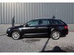 Skoda Octavia Combi - 1.6 TDI 110pk Business *VAN 12.495, - VOOR - 1 - Thumbnail