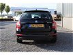 Skoda Octavia Combi - 1.6 TDI 110pk Business *VAN 12.495, - VOOR - 1 - Thumbnail