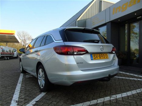 Opel Astra - ST 1.4 Turbo 150pk Online Edition + Navigatie + AGR + Trekhaak afneembaar - 1