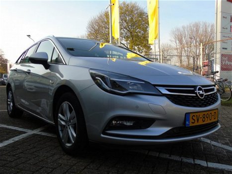 Opel Astra - ST 1.4 Turbo 150pk Online Edition + Navigatie + AGR + Trekhaak afneembaar - 1