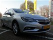 Opel Astra - ST 1.4 Turbo 150pk Online Edition + Navigatie + AGR + Trekhaak afneembaar - 1 - Thumbnail