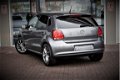 Volkswagen Polo - 1.2 Comfortline / PDC / Navigatie / Climate c - 1 - Thumbnail