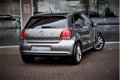 Volkswagen Polo - 1.2 Comfortline / PDC / Navigatie / Climate c - 1 - Thumbnail