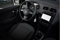 Volkswagen Polo - 1.2 Comfortline / PDC / Navigatie / Climate c - 1 - Thumbnail