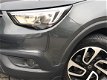 Opel Crossland X - 1.2 Turbo Online Edition Airco/Navi/PDC achter/LM Velgen/trekhaak >>Nieuw binnen< - 1 - Thumbnail