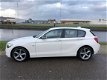 BMW 1-serie - 116i Business+ / Harman Kardon / PDC / Groot navi / Sport / 5 deurs - 1 - Thumbnail