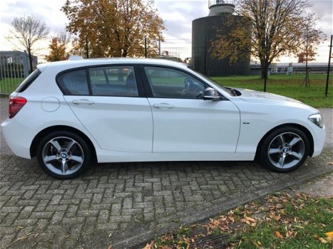 BMW 1-serie - 116i Business+ / Harman Kardon / PDC / Groot navi / Sport / 5 deurs - 1