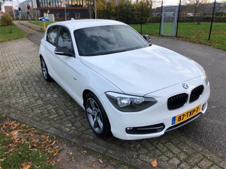 BMW 1-serie - 116i Business+ / Harman Kardon / PDC / Groot navi / Sport / 5 deurs - 1