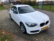 BMW 1-serie - 116i Business+ / Harman Kardon / PDC / Groot navi / Sport / 5 deurs - 1 - Thumbnail