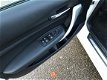 BMW 1-serie - 116i Business+ / Harman Kardon / PDC / Groot navi / Sport / 5 deurs - 1 - Thumbnail