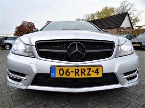 Mercedes-Benz C-klasse Coupé - 180 AMG-uitgevoerd | C63 | Xenon | Navigatie | NAP | NL Auto | 18 inc - 1