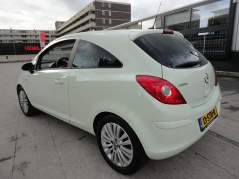 Opel Corsa - 1.2-16V Cosmo - 1