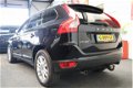 Volvo XC60 - 2.4 D5 AWD Summum LEDER NAVIGATIE CRUISE CONTROL TEL PDC AFN. TREKHAAK XENON ZEER MOOI - 1 - Thumbnail